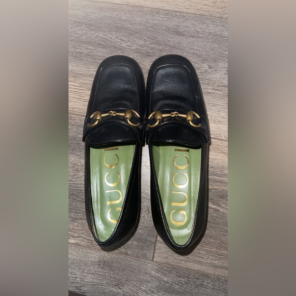 Black Gucci loafers